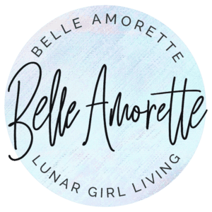 Blog logo in pastel circle. Text in circle Belle Amorette Lunar Girl Living